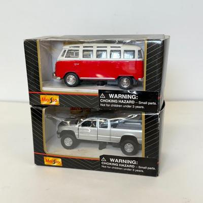LOT 102: Collection of Maisto Car Models in Package & More