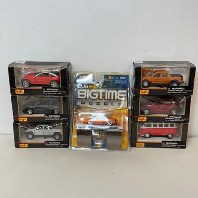LOT 102: Collection of Maisto Car Models in Package & More