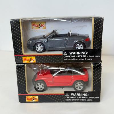 LOT 102: Collection of Maisto Car Models in Package & More