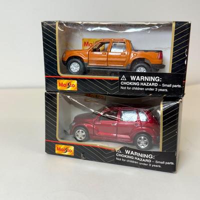 LOT 102: Collection of Maisto Car Models in Package & More