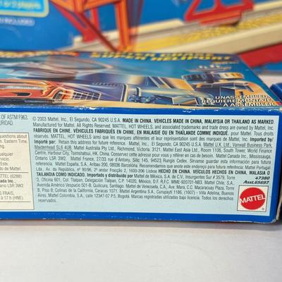 LOT 105: Big Hot Wheels Collection: Packaged Sets, Dewalt Stopwatch & More