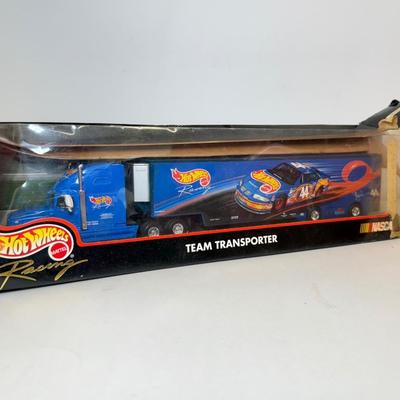 LOT 105: Big Hot Wheels Collection: Packaged Sets, Dewalt Stopwatch & More