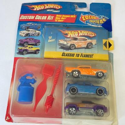 LOT 105: Big Hot Wheels Collection: Packaged Sets, Dewalt Stopwatch & More