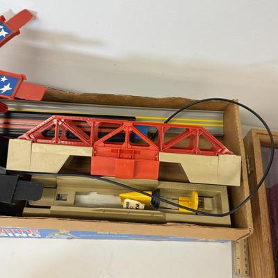 LOT 105: Big Hot Wheels Collection: Packaged Sets, Dewalt Stopwatch & More