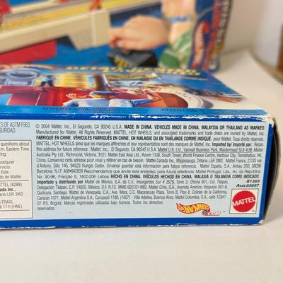 LOT 105: Big Hot Wheels Collection: Packaged Sets, Dewalt Stopwatch & More