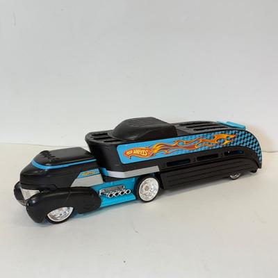 LOT 106: Mattel Hot Wheels Car Carrying Trucks