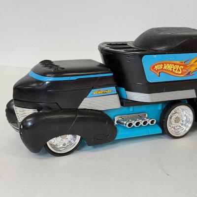 LOT 106: Mattel Hot Wheels Car Carrying Trucks