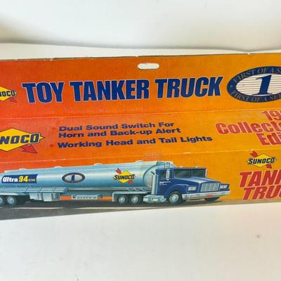 LOT 107: Sunoco Toy Tanker Truck, 2004 Race Car Hauler, Mobile Racing Truck, Humble Toy Tanker Truck & Mobil Collectible Toy Truck