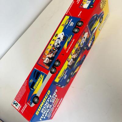 LOT 107: Sunoco Toy Tanker Truck, 2004 Race Car Hauler, Mobile Racing Truck, Humble Toy Tanker Truck & Mobil Collectible Toy Truck