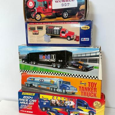 LOT 107: Sunoco Toy Tanker Truck, 2004 Race Car Hauler, Mobile Racing Truck, Humble Toy Tanker Truck & Mobil Collectible Toy Truck