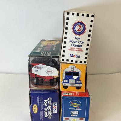 LOT 107: Sunoco Toy Tanker Truck, 2004 Race Car Hauler, Mobile Racing Truck, Humble Toy Tanker Truck & Mobil Collectible Toy Truck