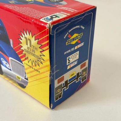 LOT 107: Sunoco Toy Tanker Truck, 2004 Race Car Hauler, Mobile Racing Truck, Humble Toy Tanker Truck & Mobil Collectible Toy Truck