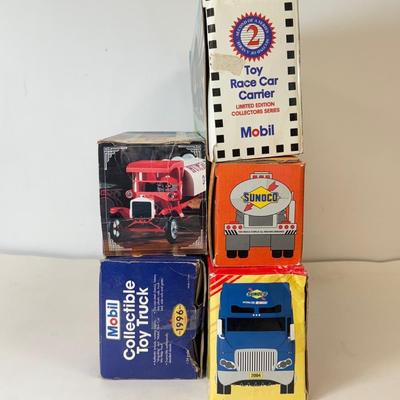 LOT 107: Sunoco Toy Tanker Truck, 2004 Race Car Hauler, Mobile Racing Truck, Humble Toy Tanker Truck & Mobil Collectible Toy Truck