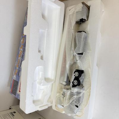 LOT 108: Exxon Diesel Cast Tanker Truck, Lukoil Corvette Carrier, 1999 Mobil LE Collector Toy Truck & More