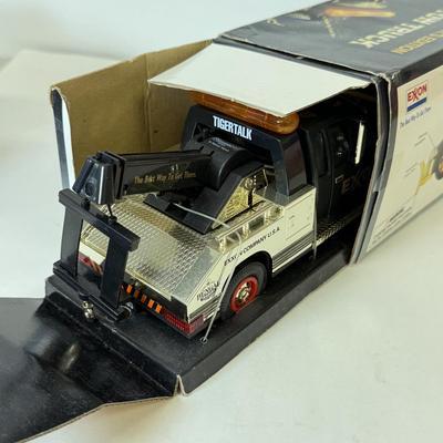 LOT 108: Exxon Diesel Cast Tanker Truck, Lukoil Corvette Carrier, 1999 Mobil LE Collector Toy Truck & More