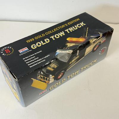 LOT 108: Exxon Diesel Cast Tanker Truck, Lukoil Corvette Carrier, 1999 Mobil LE Collector Toy Truck & More