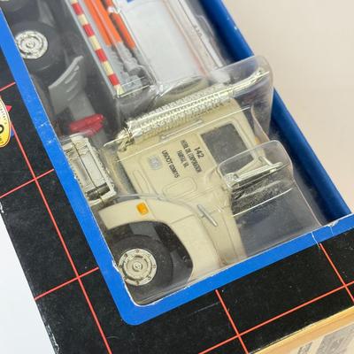 LOT 108: Exxon Diesel Cast Tanker Truck, Lukoil Corvette Carrier, 1999 Mobil LE Collector Toy Truck & More