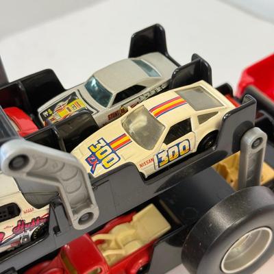LOT 109: Hot Wheels: Highway 35 World Race Carrying Case, Airplane w/ Storage & Racecar Case w/ Cars