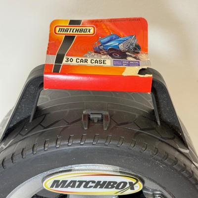 LOT 113: Tara Matchbox 30 Car Carrying Cases w/ Cars