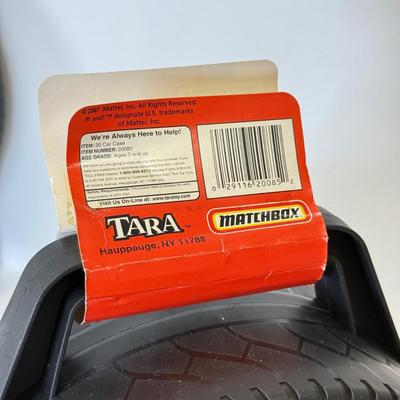 LOT 114: Tara Matchbox 30 Car Carrying Cases w/ Cars