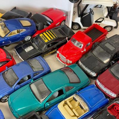 LOT 117: Die Cast & More Car Models: Tootsietoy, Welly & More