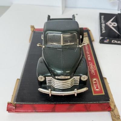 LOT 119: Franklin Mint Precision Models 1:24 Scale 1948 Tucker, Chevrolet Small Block Engine Model & Miro Chevy Pickup Model