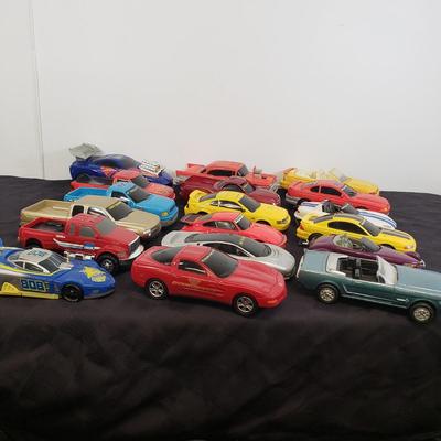 LOT 141: Large Assortment of Plastic Cars & Trucks- Vintage Nascar Racers 808 Flyer, Hot Wheels Flamethrower & More