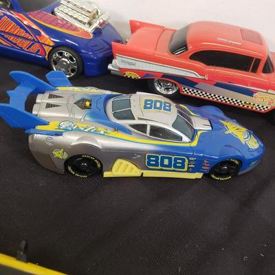 LOT 141: Large Assortment of Plastic Cars & Trucks- Vintage Nascar Racers 808 Flyer, Hot Wheels Flamethrower & More