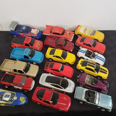 LOT 141: Large Assortment of Plastic Cars & Trucks- Vintage Nascar Racers 808 Flyer, Hot Wheels Flamethrower & More