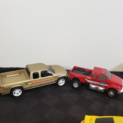 LOT 141: Large Assortment of Plastic Cars & Trucks- Vintage Nascar Racers 808 Flyer, Hot Wheels Flamethrower & More