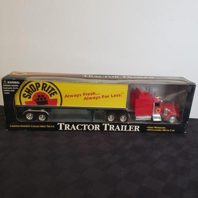 LOT 142: Vintage Shop Rite Tractor Trailers with Collectible Van Bank