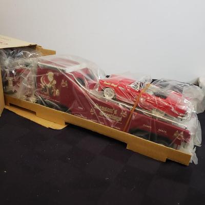 LOT 144: Taylor Trucks Christmas Sears Trucks, USA Racing Team, Peterbilt Long Hauler, 1:18 Scale Limousine & More