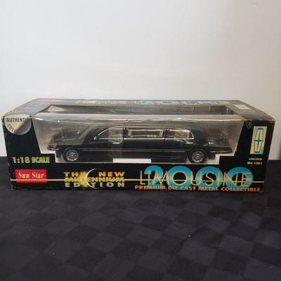 LOT 144: Taylor Trucks Christmas Sears Trucks, USA Racing Team, Peterbilt Long Hauler, 1:18 Scale Limousine & More
