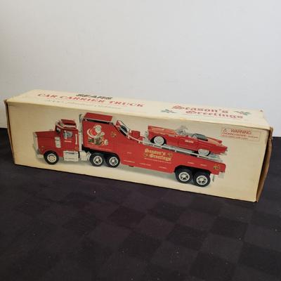 LOT 144: Taylor Trucks Christmas Sears Trucks, USA Racing Team, Peterbilt Long Hauler, 1:18 Scale Limousine & More