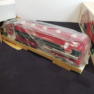 LOT 144: Taylor Trucks Christmas Sears Trucks, USA Racing Team, Peterbilt Long Hauler, 1:18 Scale Limousine & More
