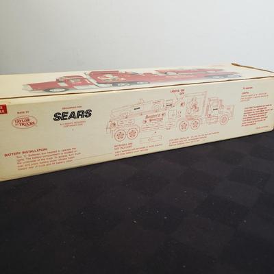 LOT 144: Taylor Trucks Christmas Sears Trucks, USA Racing Team, Peterbilt Long Hauler, 1:18 Scale Limousine & More