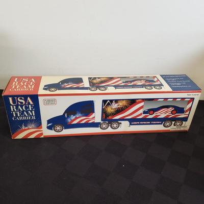 LOT 144: Taylor Trucks Christmas Sears Trucks, USA Racing Team, Peterbilt Long Hauler, 1:18 Scale Limousine & More