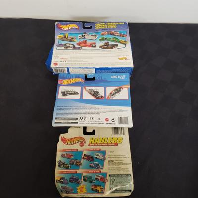 LOT 145: Hot Wheels New in Package-Final Run, Speed Demons, Light Speeders & More