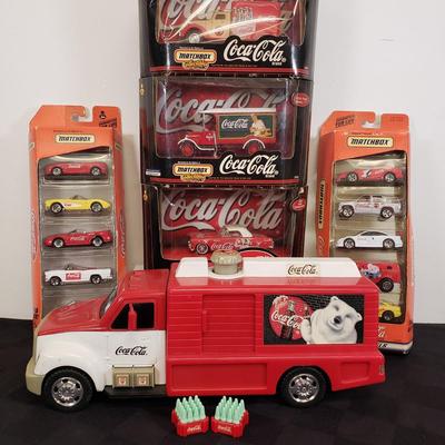 LOT 146: Coca Cola Collectibles-Matchbox New in Package & Toy Truck with Conveyor Belt & Mini Coke Bottles