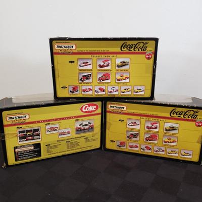 LOT 146: Coca Cola Collectibles-Matchbox New in Package & Toy Truck with Conveyor Belt & Mini Coke Bottles