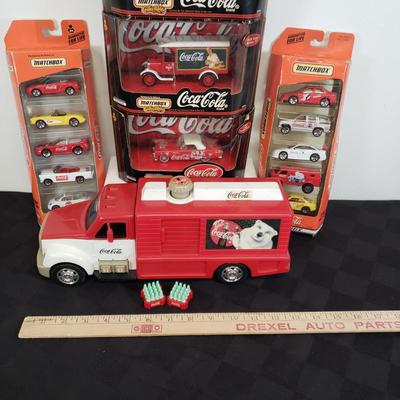 LOT 146: Coca Cola Collectibles-Matchbox New in Package & Toy Truck with Conveyor Belt & Mini Coke Bottles