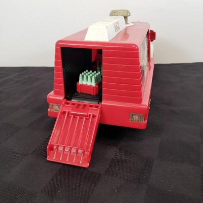 LOT 146: Coca Cola Collectibles-Matchbox New in Package & Toy Truck with Conveyor Belt & Mini Coke Bottles