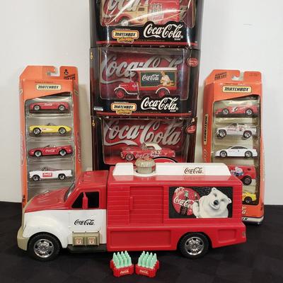 LOT 146: Coca Cola Collectibles-Matchbox New in Package & Toy Truck with Conveyor Belt & Mini Coke Bottles