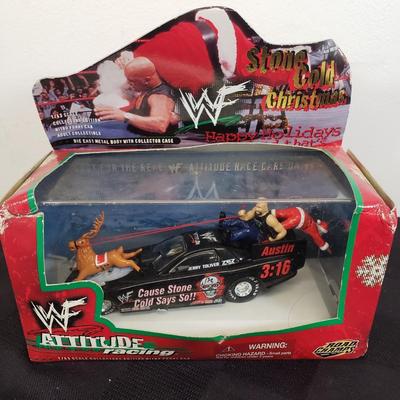 LOT 147: Vintage WWF Road Champs Cars, Roddy Piper Monster Truck, WCW Diamond Dallas Page Keychain & John Cena Action Figure