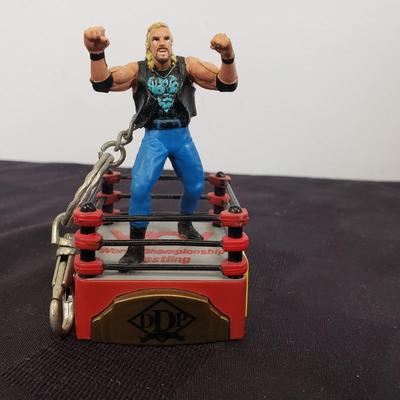 LOT 147: Vintage WWF Road Champs Cars, Roddy Piper Monster Truck, WCW Diamond Dallas Page Keychain & John Cena Action Figure