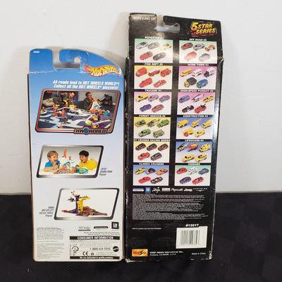 LOT 150: New in Package Assortment of Hot Wheels, Matchbox & More