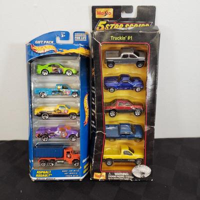 LOT 150: New in Package Assortment of Hot Wheels, Matchbox & More