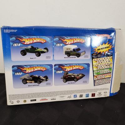 LOT 150: New in Package Assortment of Hot Wheels, Matchbox & More