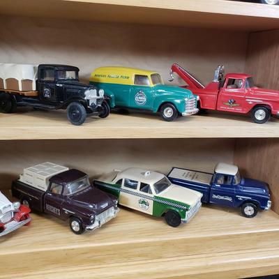 LOT 151: Princeton Gallery Popular Company Branded Trucks on Display Shelf