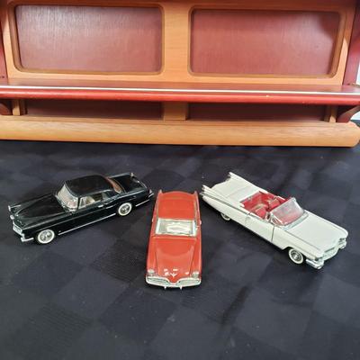 LOT 152: Classic Cars of the Fifties by Franklin Mint with Display Shelf